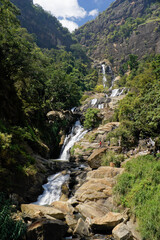 Fototapeta na wymiar Rawana Ella Falls (also known as Bambaragama Falls) in Sri Lanka's Hill Country