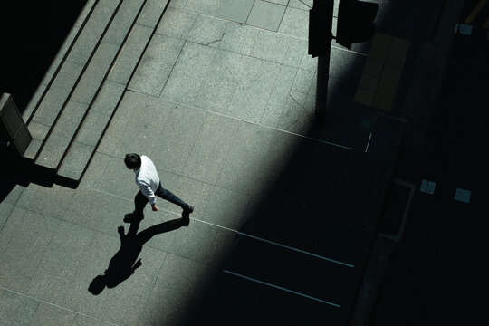 Man walking in pavement