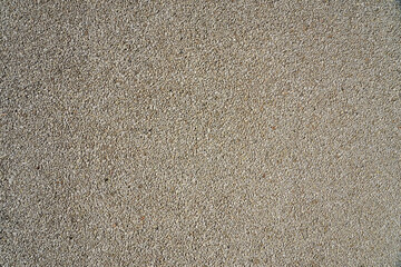 A wall of granite stones as a background.