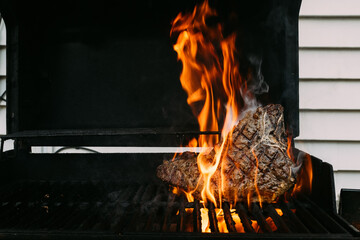 Grilled steak over fire