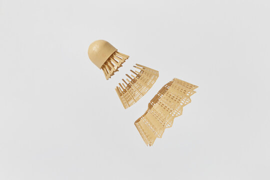 Plastic badminton shuttlecock is cut on three parts