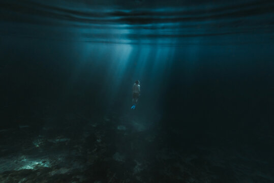 Man swims underwater