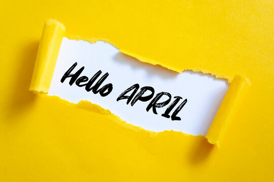 Hello April concept. Inscription in torn envelope
