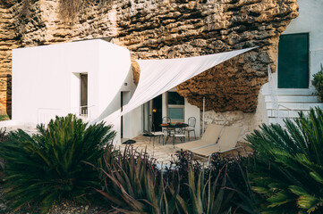 Rural house on green meadow in countryside