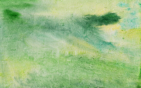 Green watercolor on textured paper