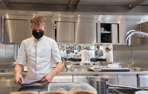 Cook Working At Kitchen