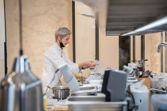 Chef Working At Kitchen