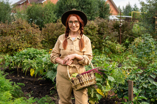 senior woman posing with the harvested