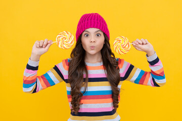 making face. lollipop lady. hipster kid with colorful lollypop sugar candy on stick. caramel candy