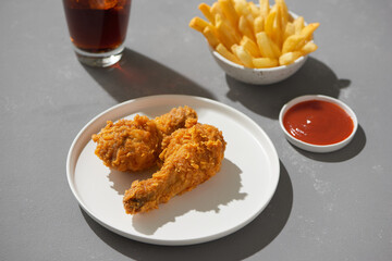 Fast Food package, french fries chicken soft drink