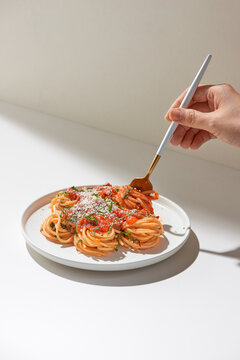 Spaghetti with tomato sauce close up