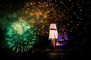 USA, Pennsylvania, Erie. Fireworks and sailing ship at night. - obrazy, fototapety, plakaty