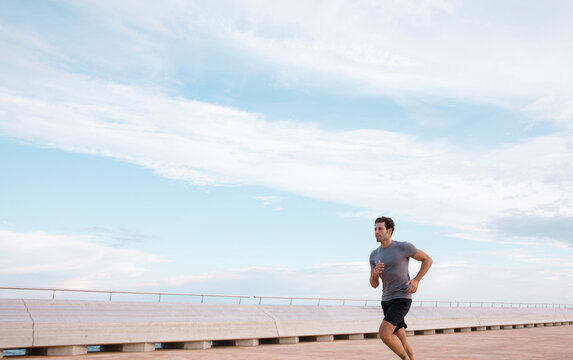 Running Sportsman On Paved Waterfront