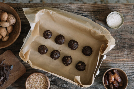 Still Life From Above Of Raw Energy Balls With Nuts