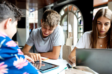 Students using gadgets for studying