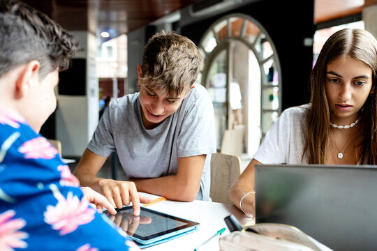 Students using gadgets for studying