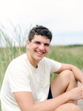 Senior photos of teen boy at marshland