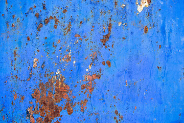 Texture of corroding metal with grungy blue paint
