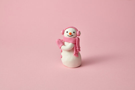 Handmade plasticine or modeling clay figure of Snowman.