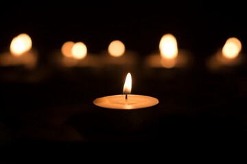 candles that are lit in the dark