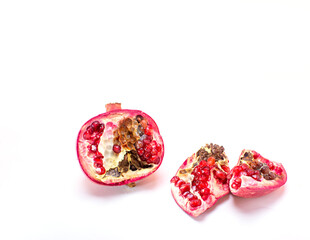 Rotten rotten pomegranate fruits. Top view. on white background