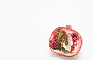 Rotten rotten pomegranate fruits. Top view. on white background
