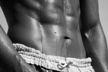 male perfect abs closeup black and white