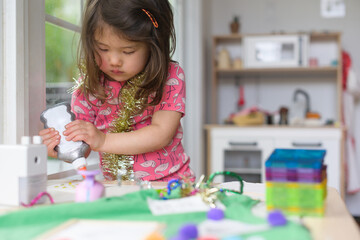 Little kid doing crafts
