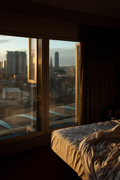 Hotel room above Waterloo station in morning sunshine.