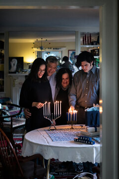Hanukkah: Family Gathers To Light Two Menorahs