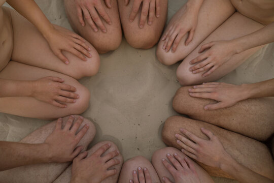 hands and feet of people together in a beautiful rhythmic shape