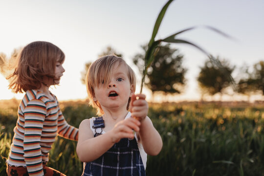 boy in wheat paddock