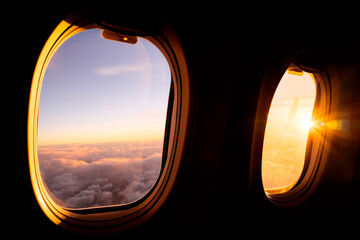 Sunrise light through airplane windows