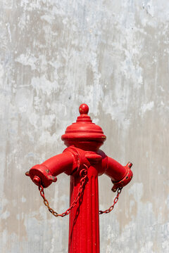 Fire hydrant isolated over a gray and white textured background