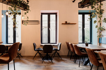 View of a stylish cafeteria with empty tables