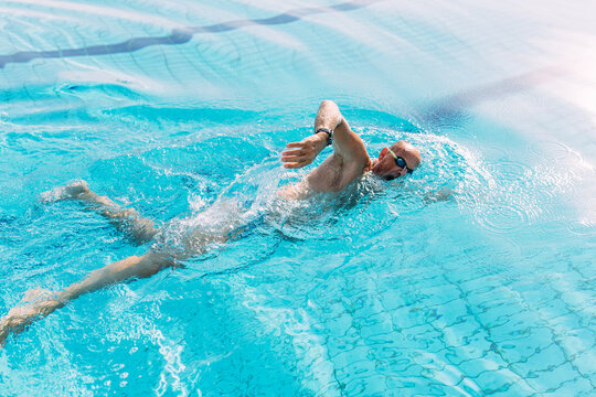 Active Senior Man Swimming