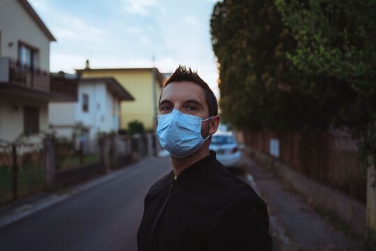 Man wearing Protective surgical Mask outdoor