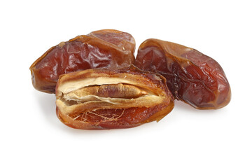 Two dried dates and half isolated on white