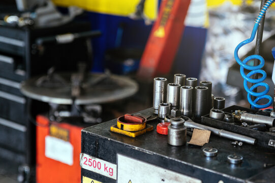 Tools placed on battery in garage