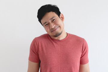 Fototapeta premium Smile face of Happy Asian man in red t-shirt isolated on white background.