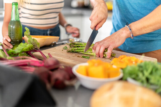 Man Cuts Asparagus