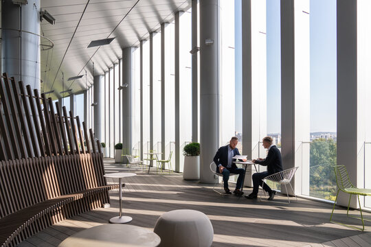 Two Businessman Working With Documents