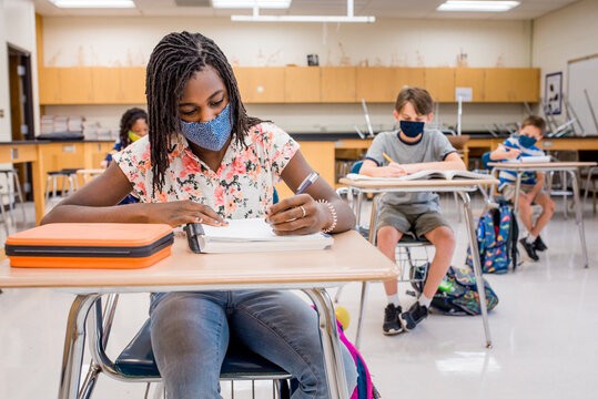 Black girl in a reduced size class in school