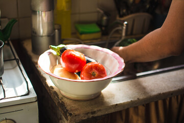 Washing vegetables in the sink