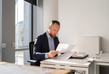 Real Estate Manager Checking Floor Plan