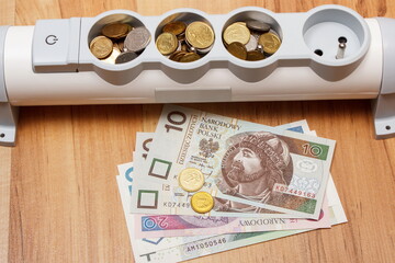 Electrical power strip and polish currency, energy costs