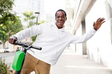 Fototapeta premium White hoodie on a man with scooter