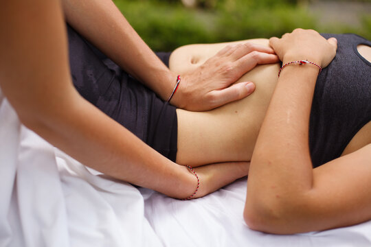 Osteopath Woman Working With A Patient