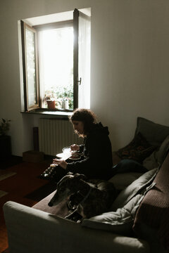 Playing a dobro guitar at home