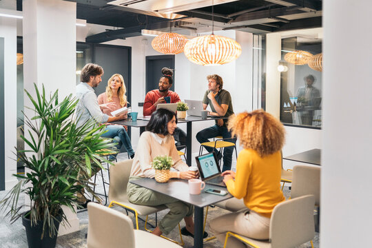 Coworkers Chatting During Coffee Break